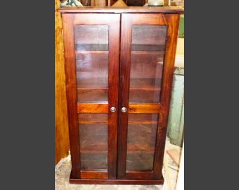 Glass door bookcase, custom built for a client in Blouberg. Glass door bookcase