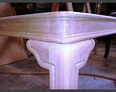 A new leg, shaped and fashioned for a broken table. New table leg